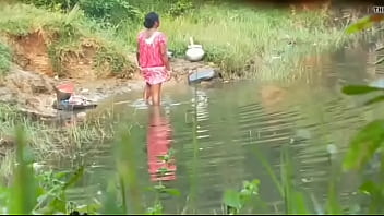 boy watching girl taking bath