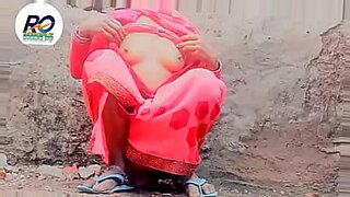 indian aunty lifting her saree up peeing