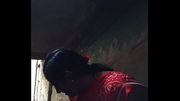 indian aunty lifting her saree up peeing