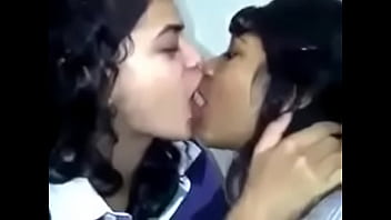 a boy removing girls bar and kissing her boobs