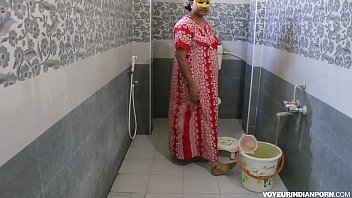 an indian uncle fucking a aunty in bathroom while taking bath