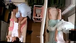 husband watching stranger who giving massage to hes wife