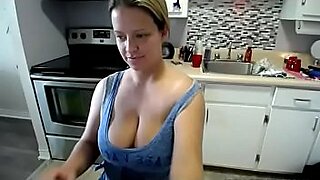 chubby brunette with big tits stripping in kitchen mobile