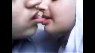 asian girl fingering herself kissing with her girlfriend on the bed