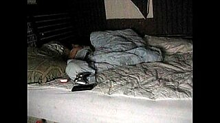 mom son share bed hotel sleep